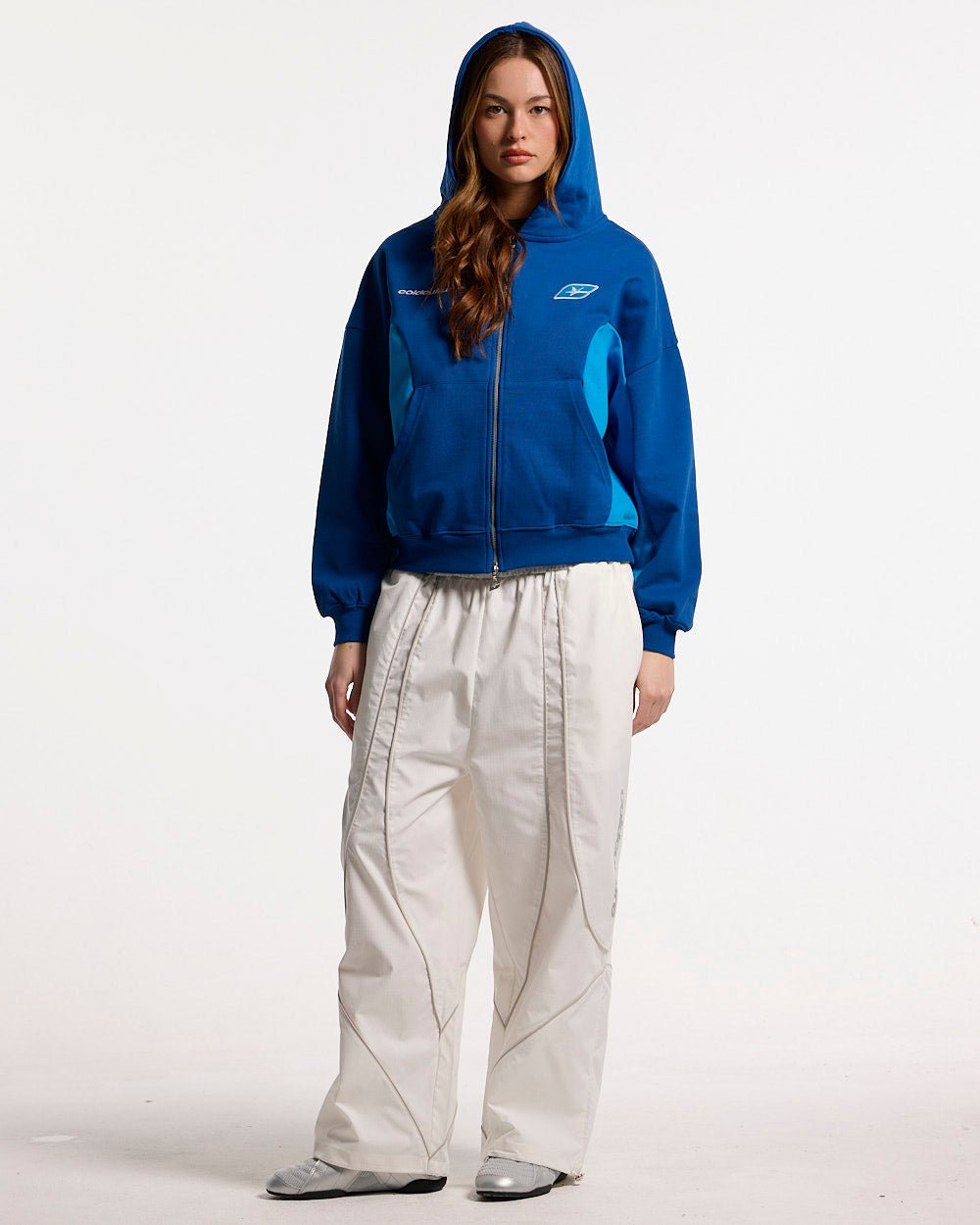TWISTTER ZIP HOODIE BLUE - blue zip-up hoodie, front view on female model - Cold Culture #woman