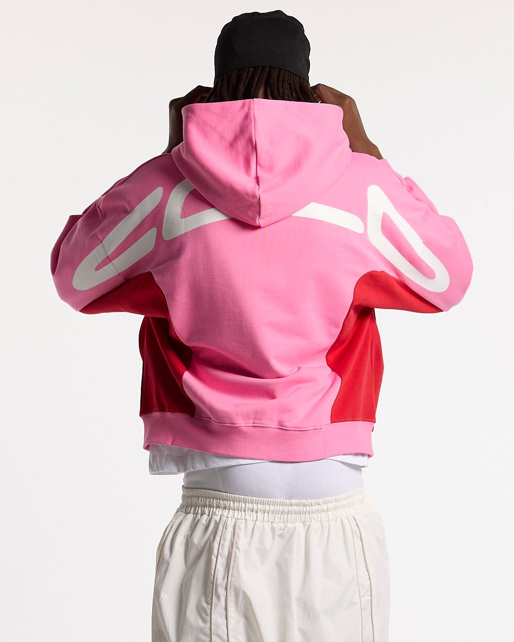 TWISTTER ZIP HOODIE PINK - pink and red zip-up hoodie, back view on male model - Cold Culture