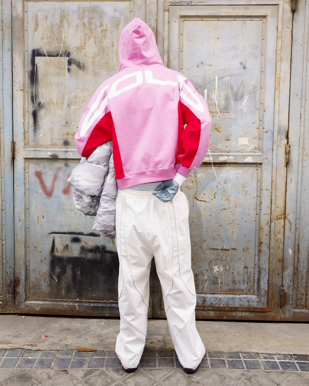 TWISTTER ZIP HOODIE PINK - pink and red zip-up hoodie, street style shot - Cold Culture