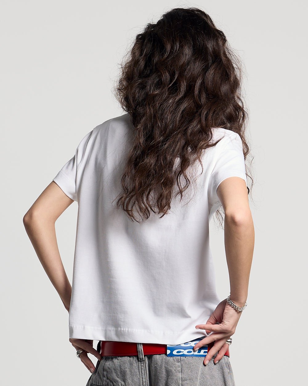 UNFILTERED TEE WHITE - white logo print tee, back view on female model - Cold Culture #woman
