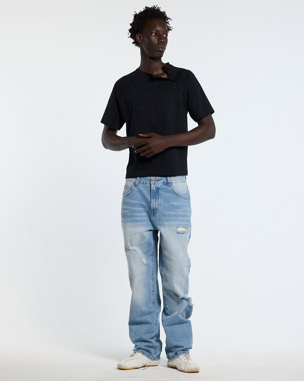 UNIT 05 TEE BLACK - black buttoned shoulder tee, front view on male model - Cold Culture #man