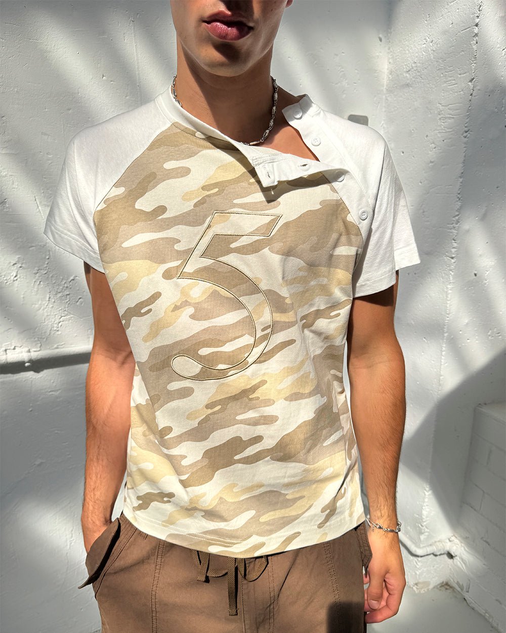 UNIT 05 TEE CAMO - beige camo raglan tee, on model close-up - Cold Culture