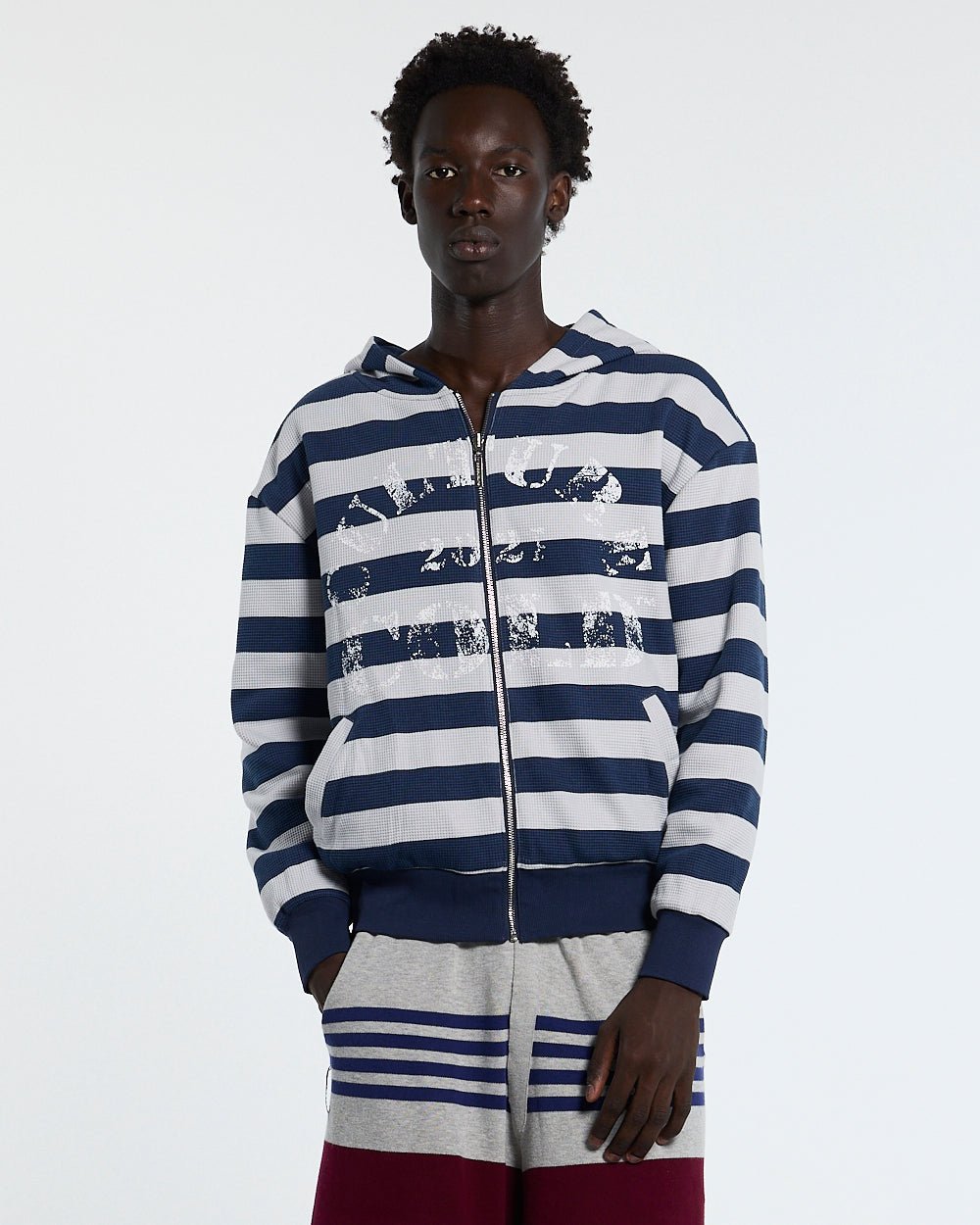 UNTRUE WAFFLE REVERSIBLE ZIP HOODIE BLUE - navy striped reversible zip-up hoodie, front view on male model - Cold Culture #man