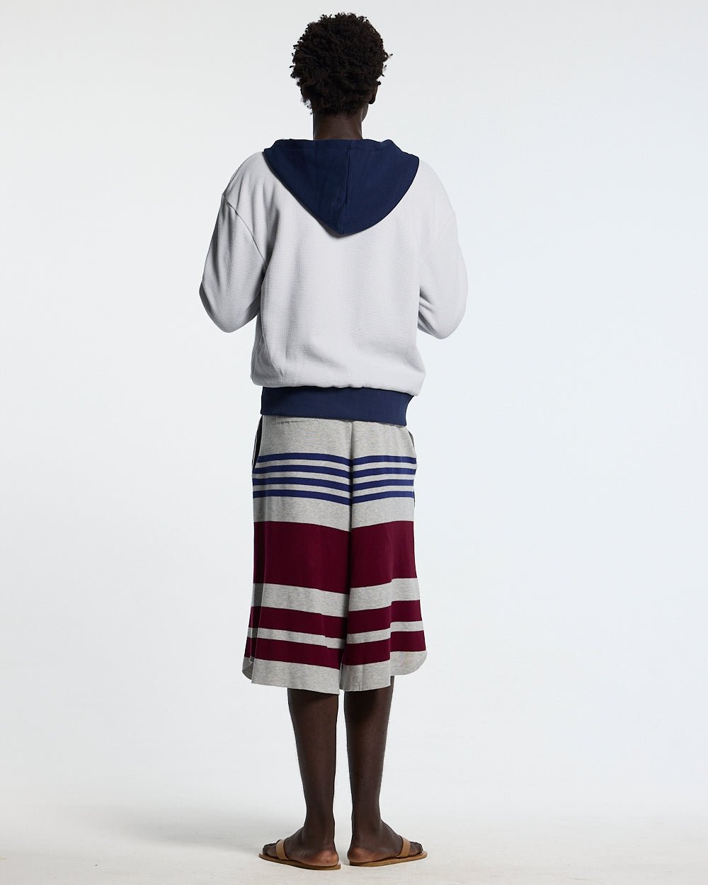 UNTRUE WAFFLE REVERSIBLE ZIP HOODIE BLUE - navy striped reversible zip-up hoodie, back view on male model - Cold Culture #man
