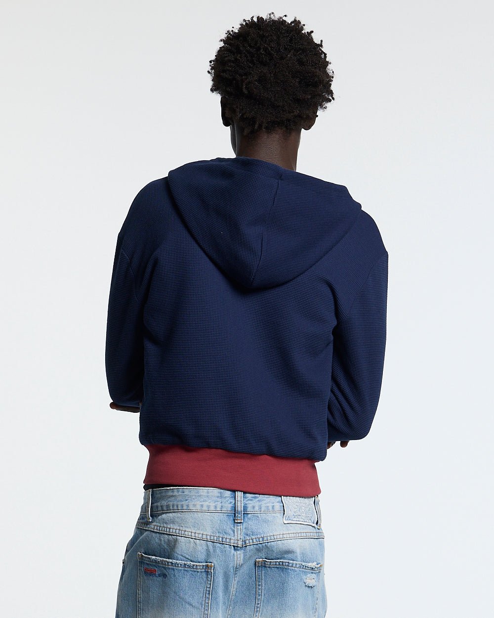 UNTRUE WAFFLE REVERSIBLE ZIP HOODIE PINK - pink striped reversible zip-up hoodie, back view on male model - Cold Culture #man