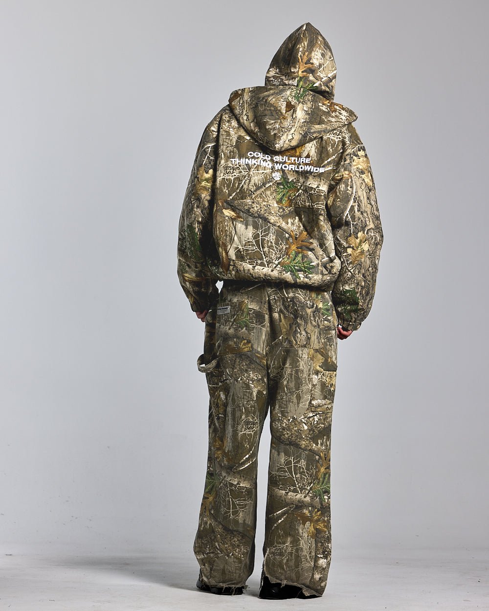V1 CARPENTER PANTS REALTREE - realtree camo carpenter pants, back view on male model - Cold Culture