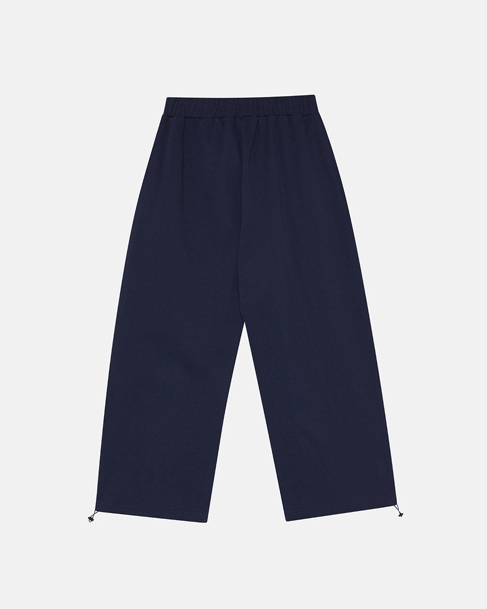 VARSITY PANTS DARK BLUE - navy blue baggy sweatpants, back view - Cold Culture #packshot