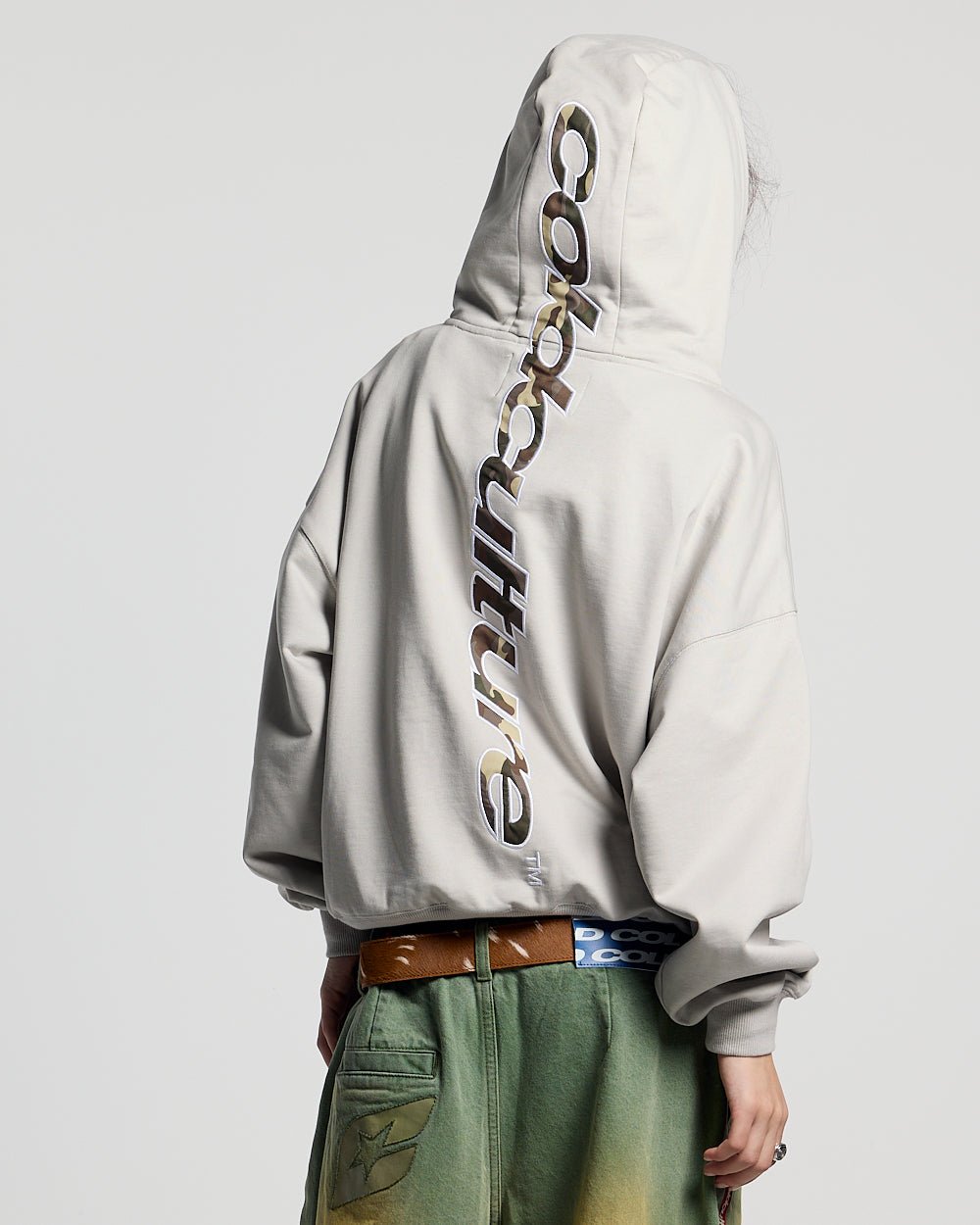VERTICAL HOODIE LIGHT GREY - light grey oversized hoodie, back view on female model - Cold Culture #woman