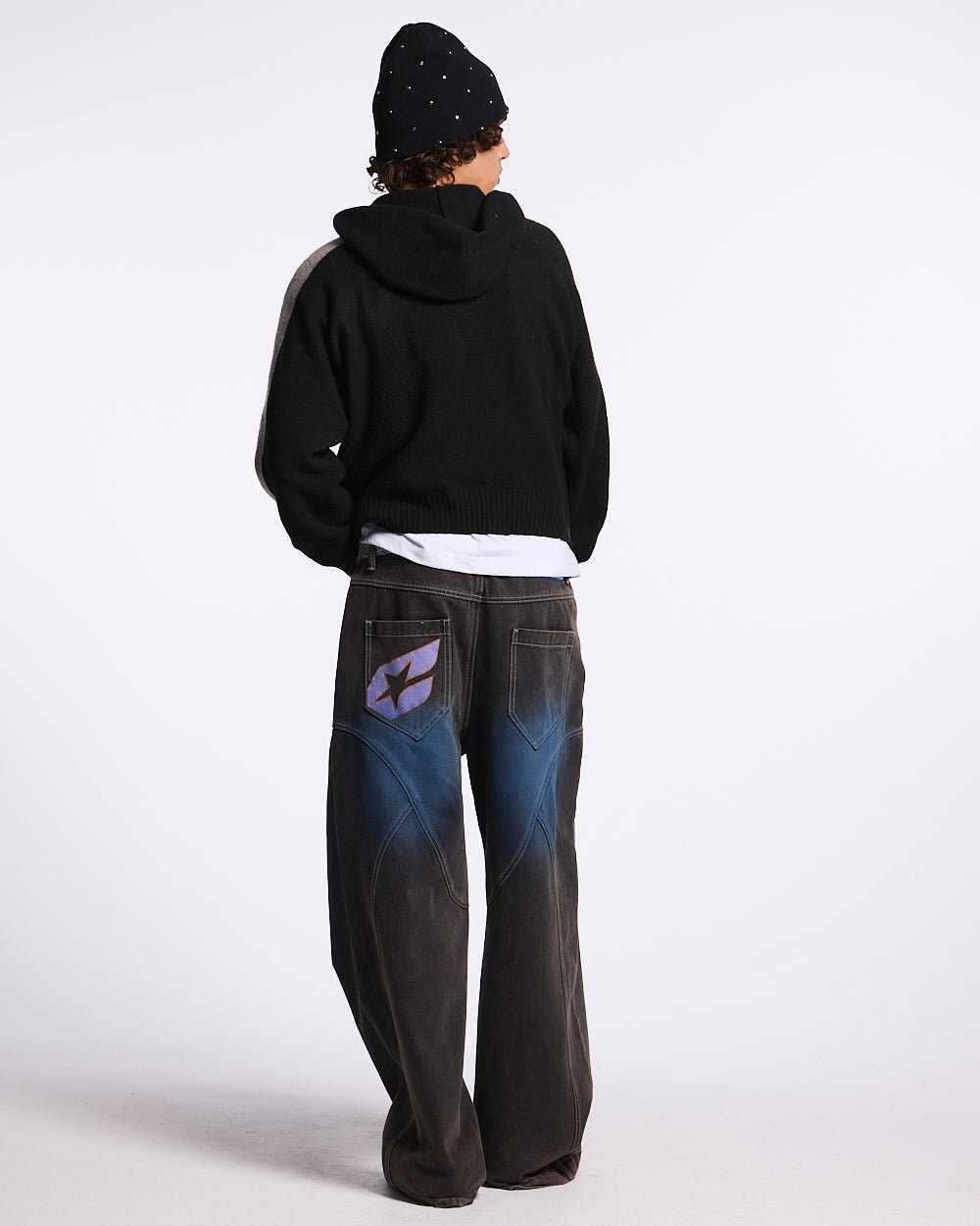 VIBRANT TEDDY KNIT BLACK - black zip-up knit sweater, back view on male model - Cold Culture #man