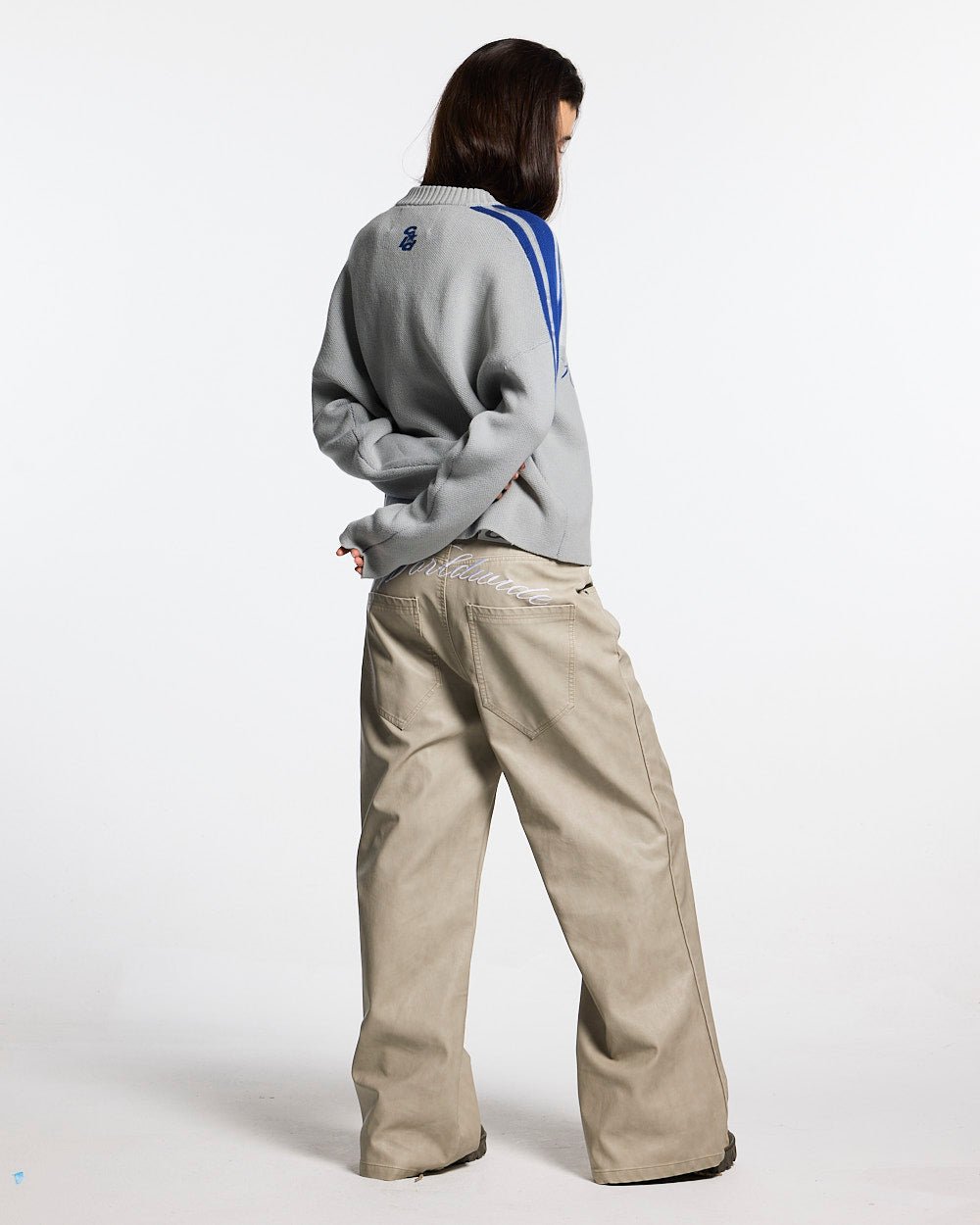 W80 KNITWEAR GREY - grey striped knit sweater, back view on female model - Cold Culture #woman