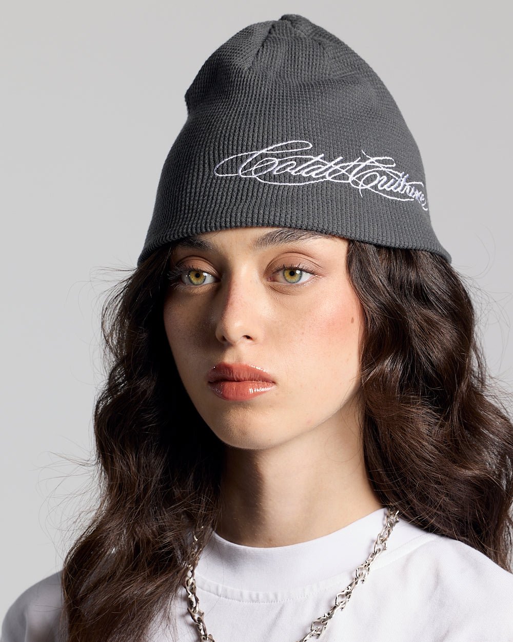 WAFFLE BEANIE BLACK - black waffle knit beanie, on model close-up - Cold Culture #woman