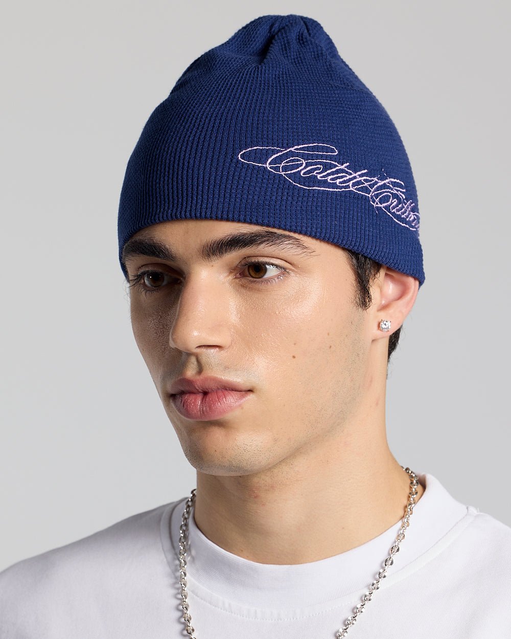 WAFFLE BEANIE BLUE - navy blue waffle knit beanie, on model close-up - Cold Culture #man