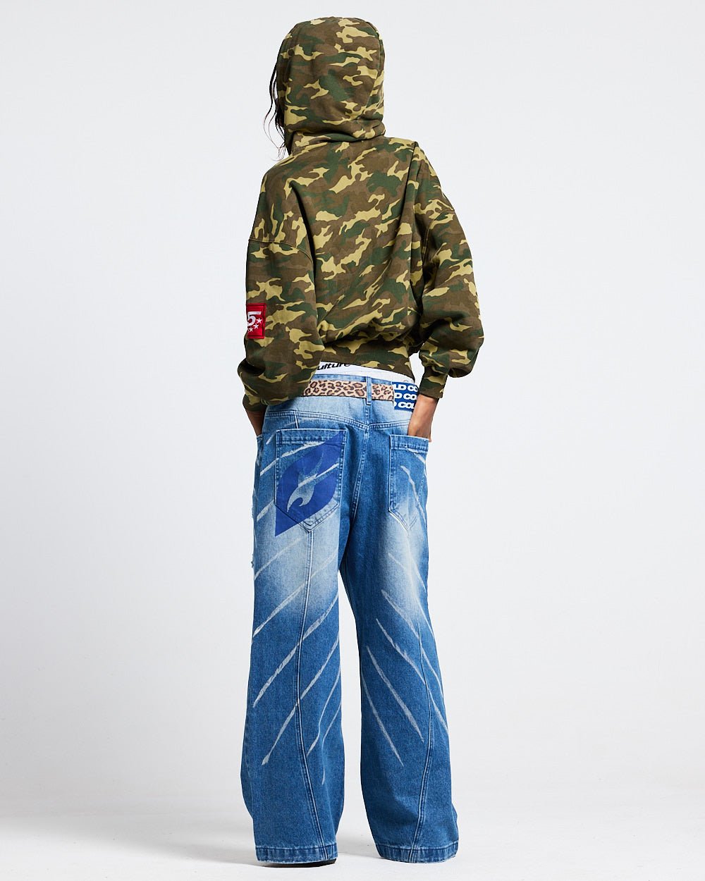 WALKER ZIP HOODIE GREEN CAMO - green camo zip-up hoodie, back view on female model - Cold Culture #woman