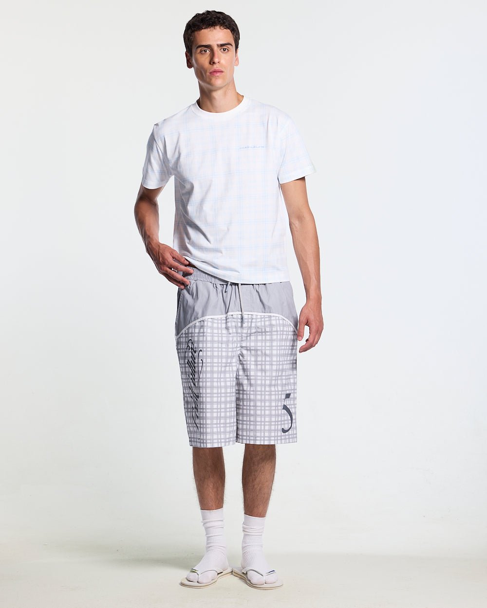 WAVE SWIMSHORTS GREY - grey checked swim shorts, front view on male model - Cold Culture #man