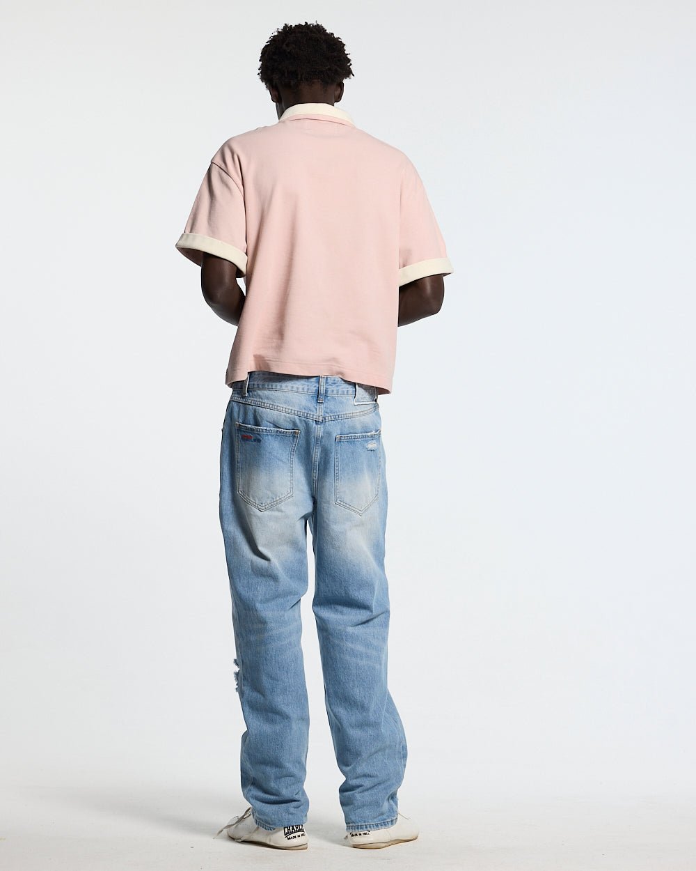 WHIP POLO PINK - pink oversized polo shirt, back view on male model - Cold Culture #man