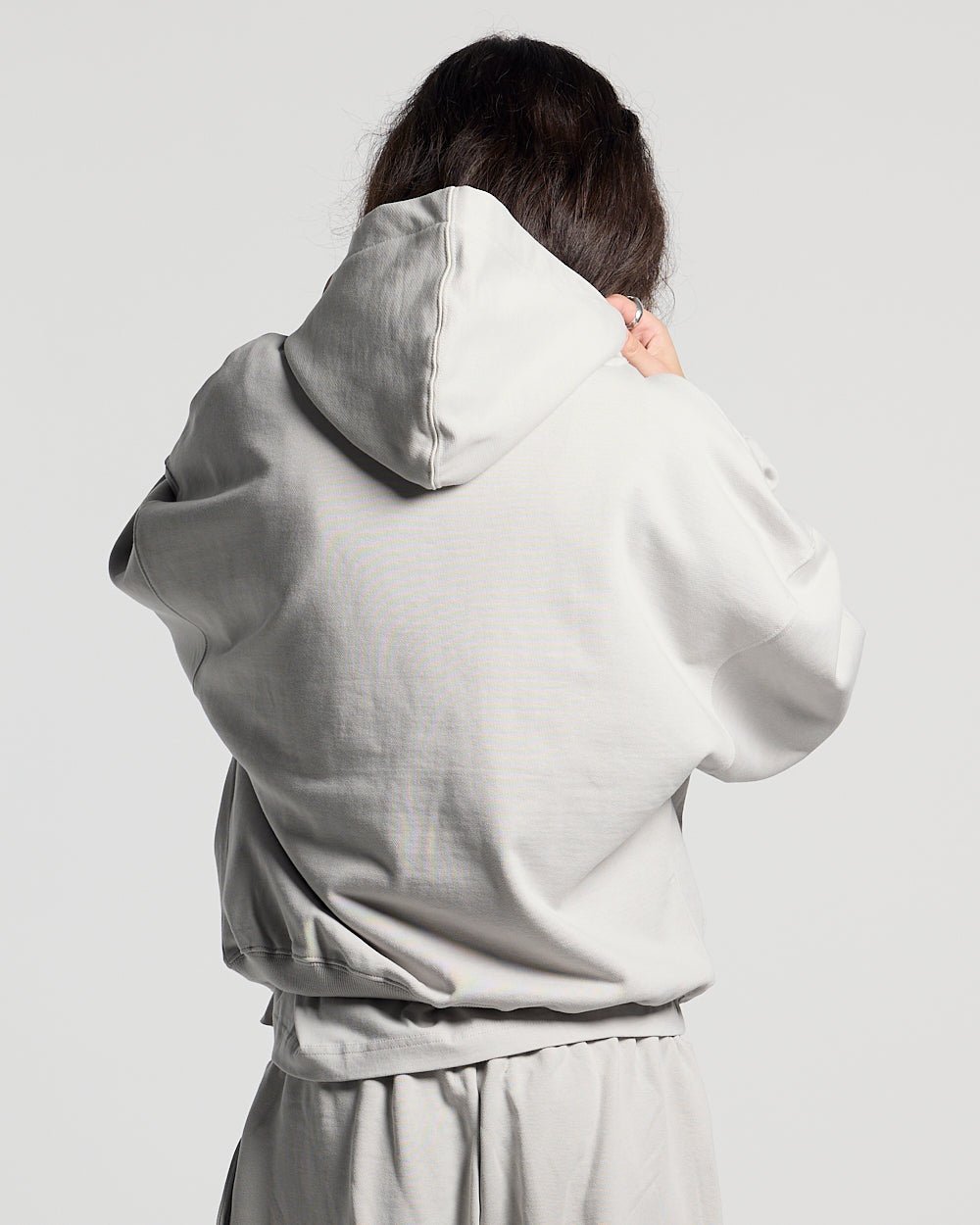 WILD CAMO HOODIE LIGHT GREY - light grey graphic print hoodie, back view on female model - Cold Culture #woman