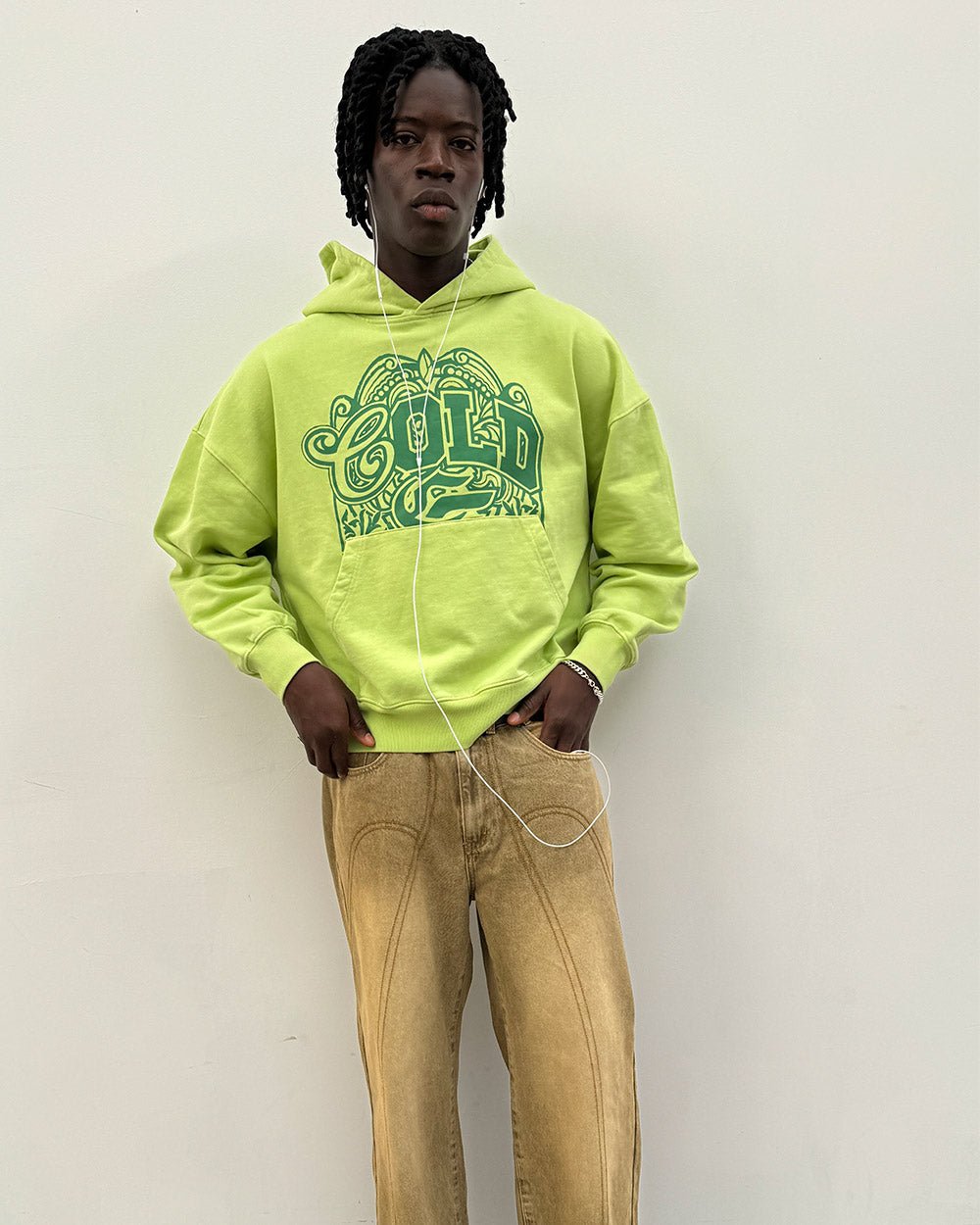 WILD HOODIE GREEN - lime green graphic print hoodie, front view on male model - Cold Culture #man