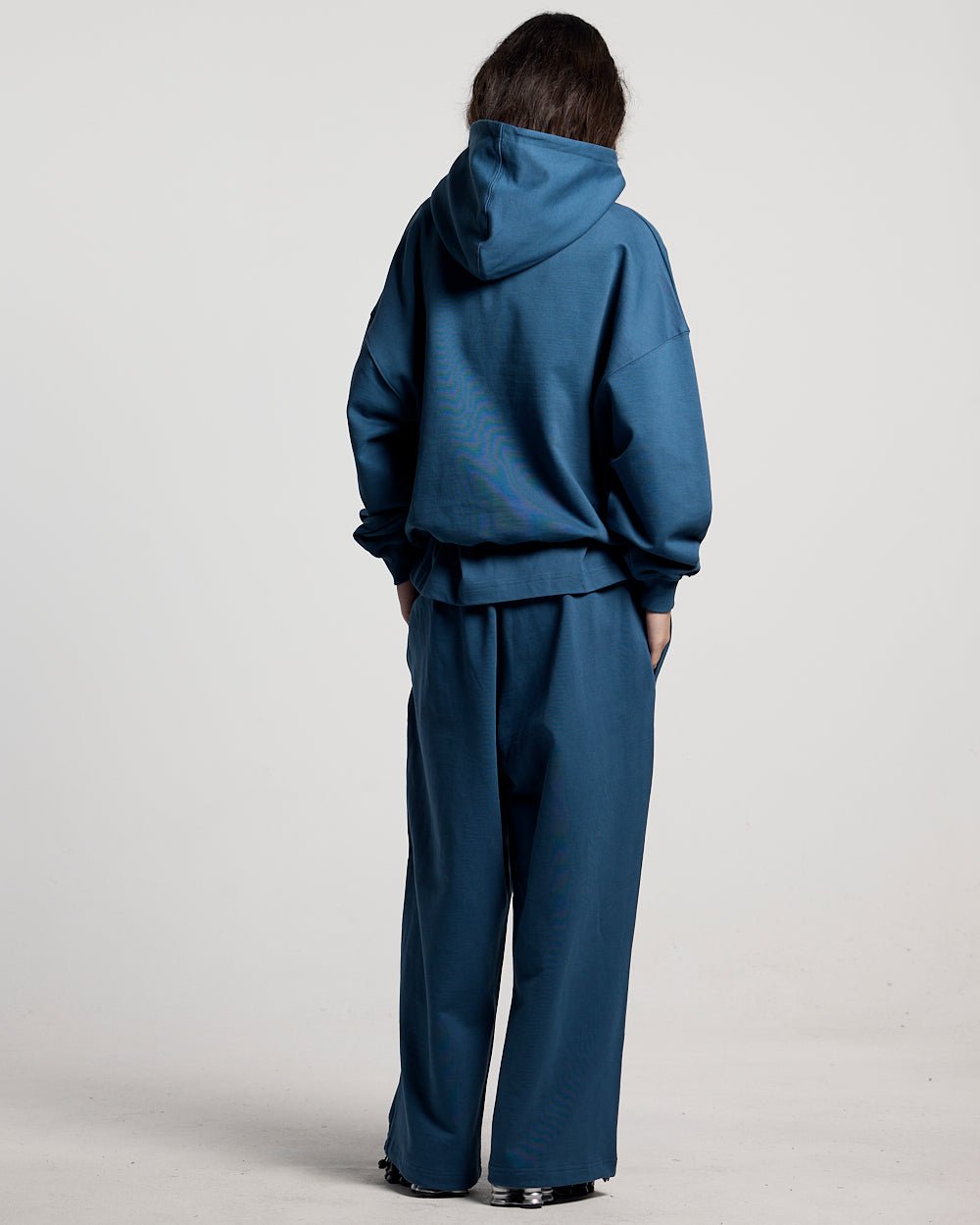 WILD SNAKE SWEATPANTS NAVY BLUE - navy blue baggy sweatpants, back view on female model - Cold Culture #woman