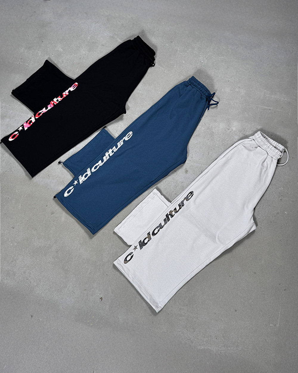 WILD SNAKE SWEATPANTS NAVY BLUE - navy blue baggy sweatpants, flat lay - Cold Culture