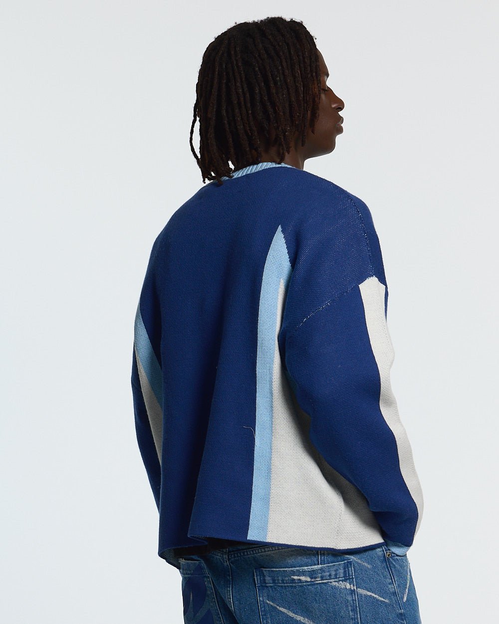 WINNER KNIT BLUE - blue and white knit sweater, back view on male model - Cold Culture #man