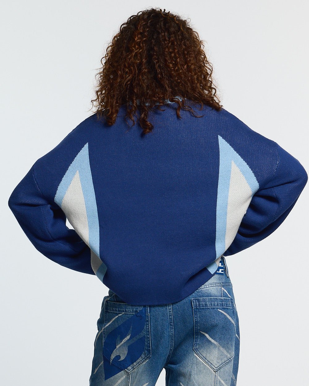 WINNER KNIT BLUE - blue and white knit sweater, back view on female model - Cold Culture #woman
