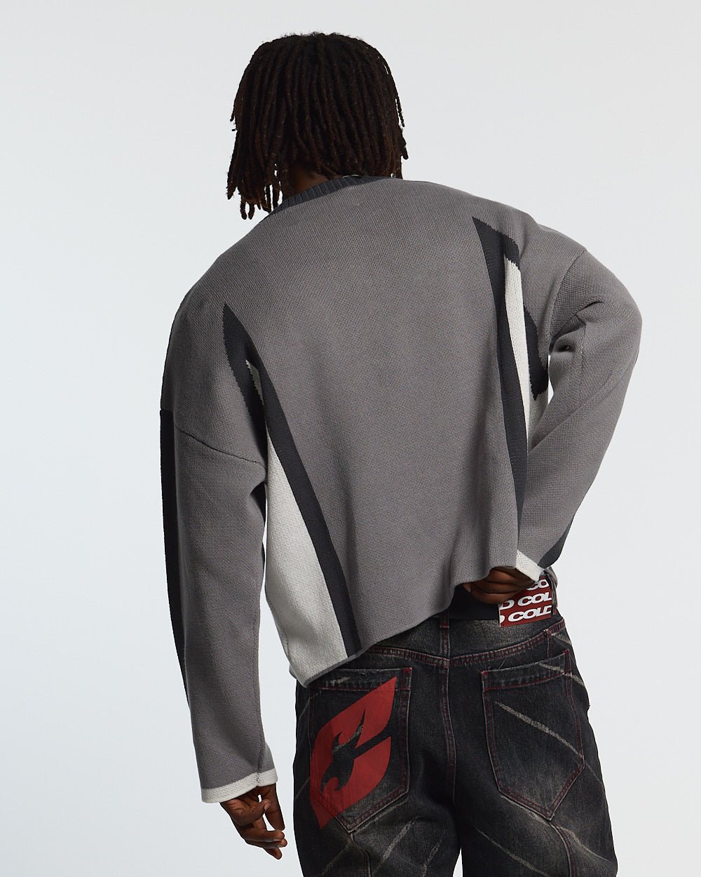 WINNER KNIT GREY, BLACK AND WHITE - grey and black knit sweater, back view on male model - Cold Culture #man