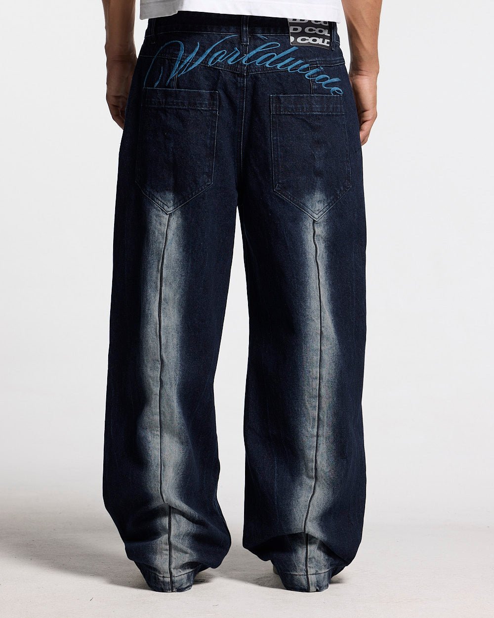 WORLDWIDE V2 PANTS DARK DENIM - dark denim baggy pants, back view on male model - Cold Culture