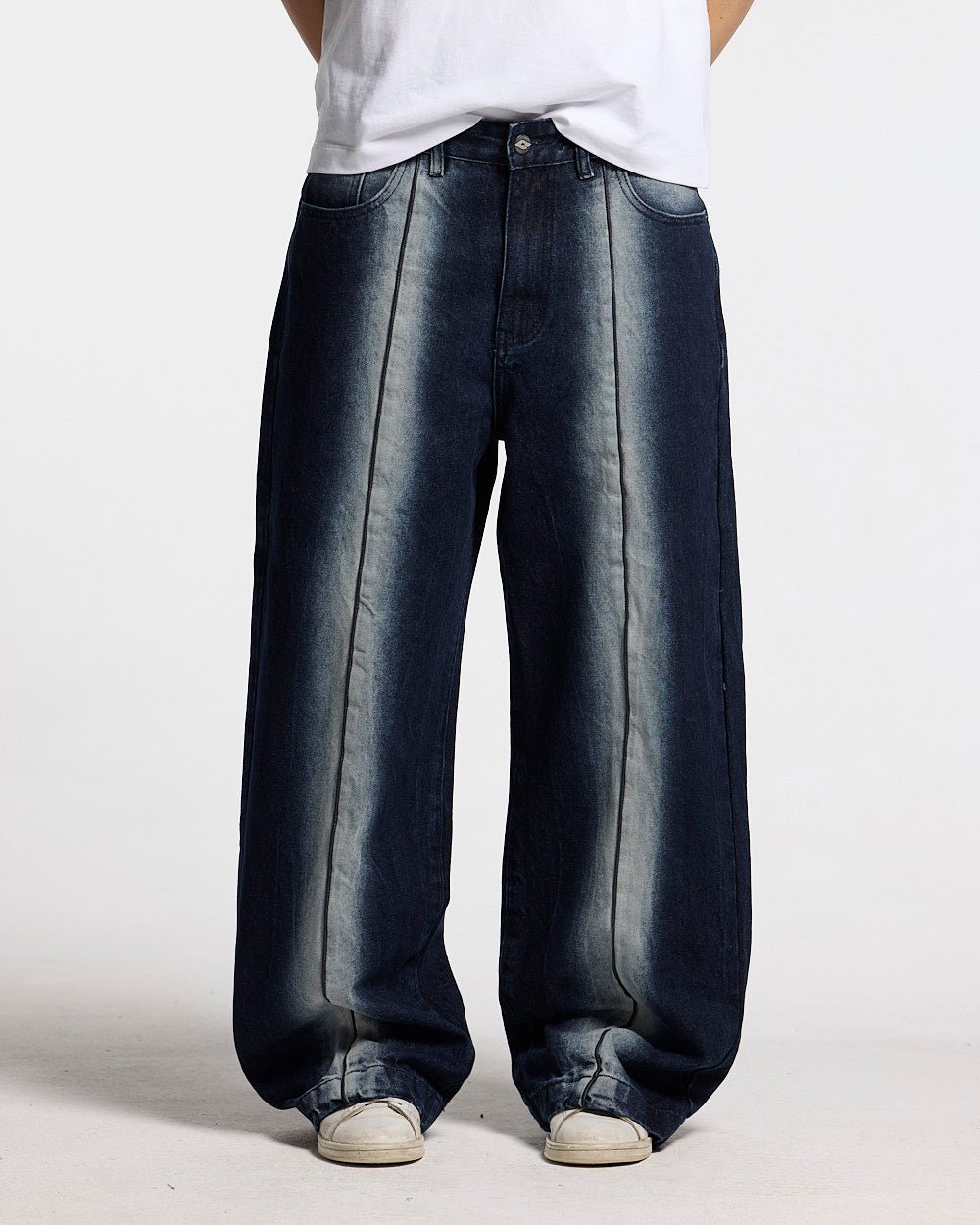 WORLDWIDE V2 PANTS DARK DENIM - dark denim baggy pants, back view on female model - Cold Culture #woman
