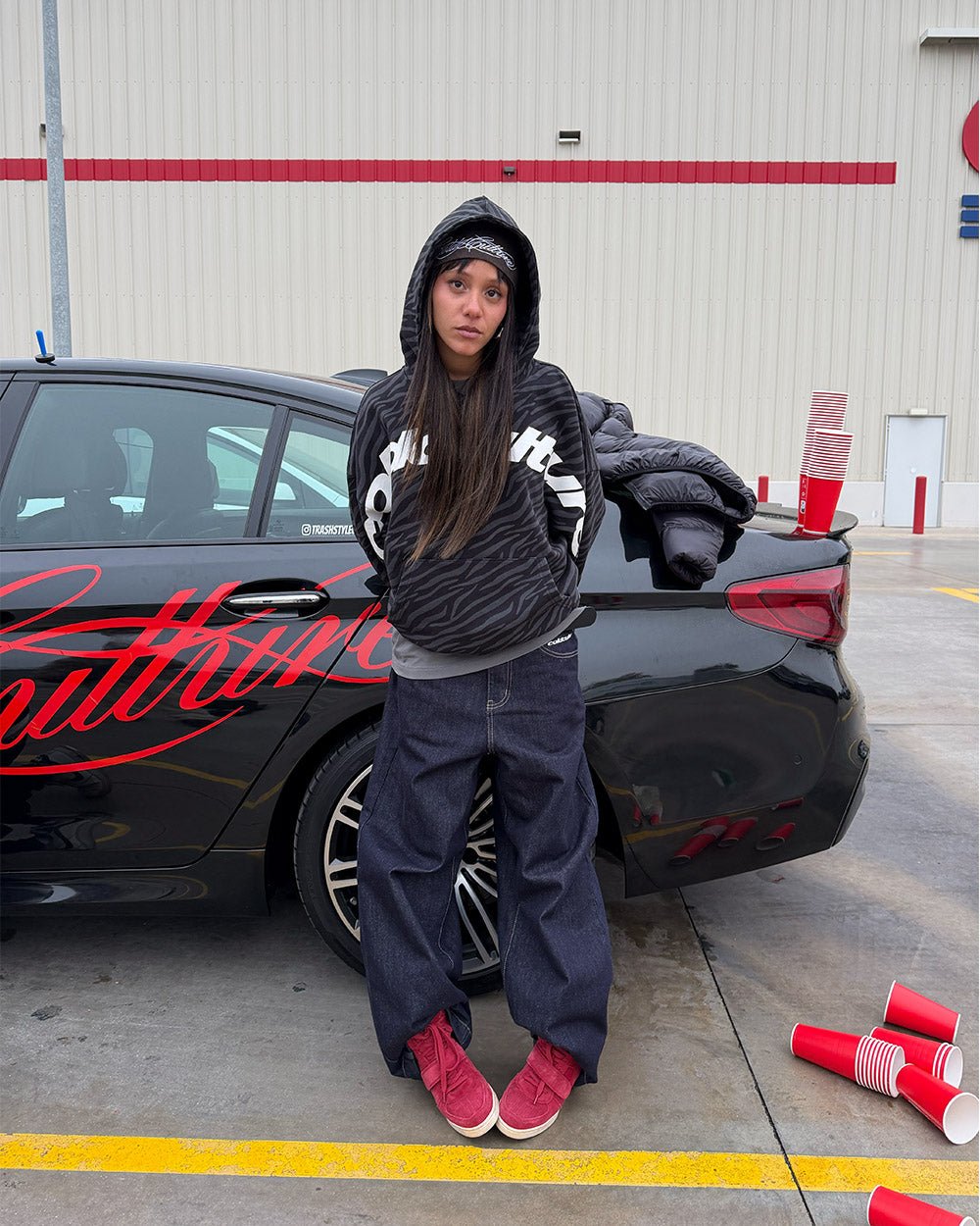 ZEBRA HOODIE BLACK - black zebra print hoodie, street style shot - Cold Culture #woman